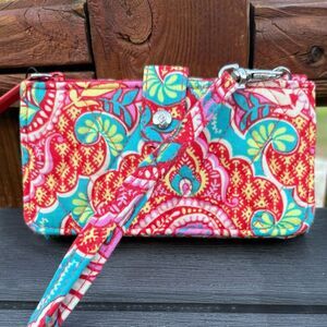 Vera Bradley Red and Blue multicolored Patterned Wristlet multiple pockets.